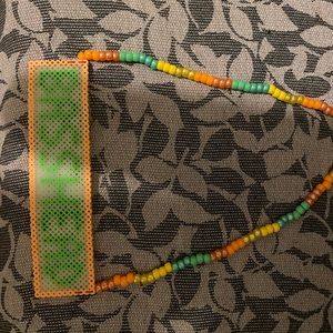Glow in the dark BASSHEAD pearler Kandi necklace